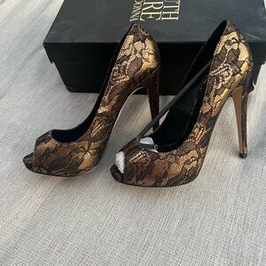 Truth or Dare by Madonna size 6.5 heel is about 4”. Sexy lace look